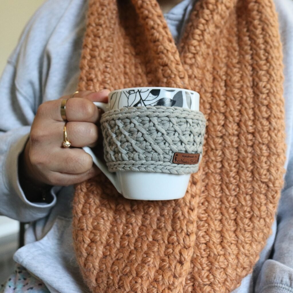 Looking for an easy free crochet cup holder pattern? Check out this fun Tunisian crochet cup holder and crochet mug holder pattern!