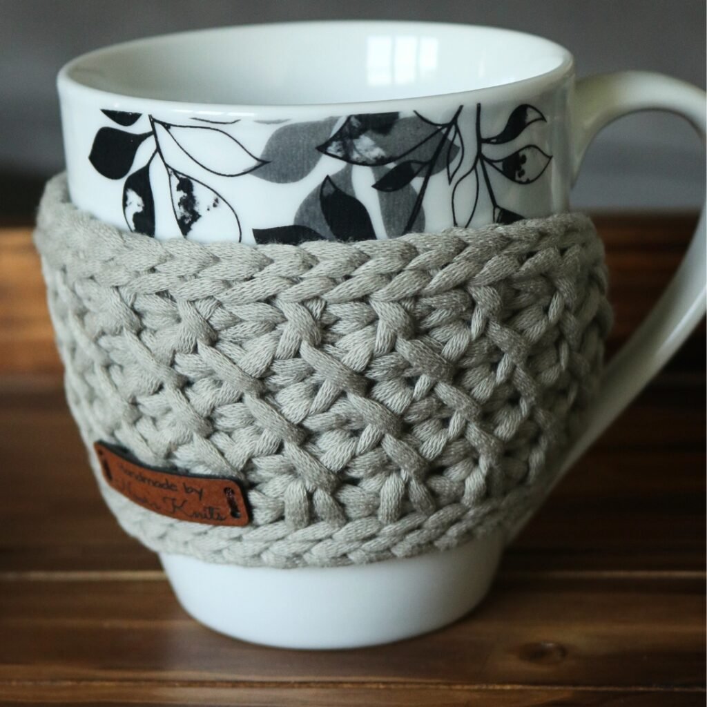 Looking for an easy free crochet cup holder pattern? Check out this fun Tunisian crochet cup holder and crochet mug holder pattern!