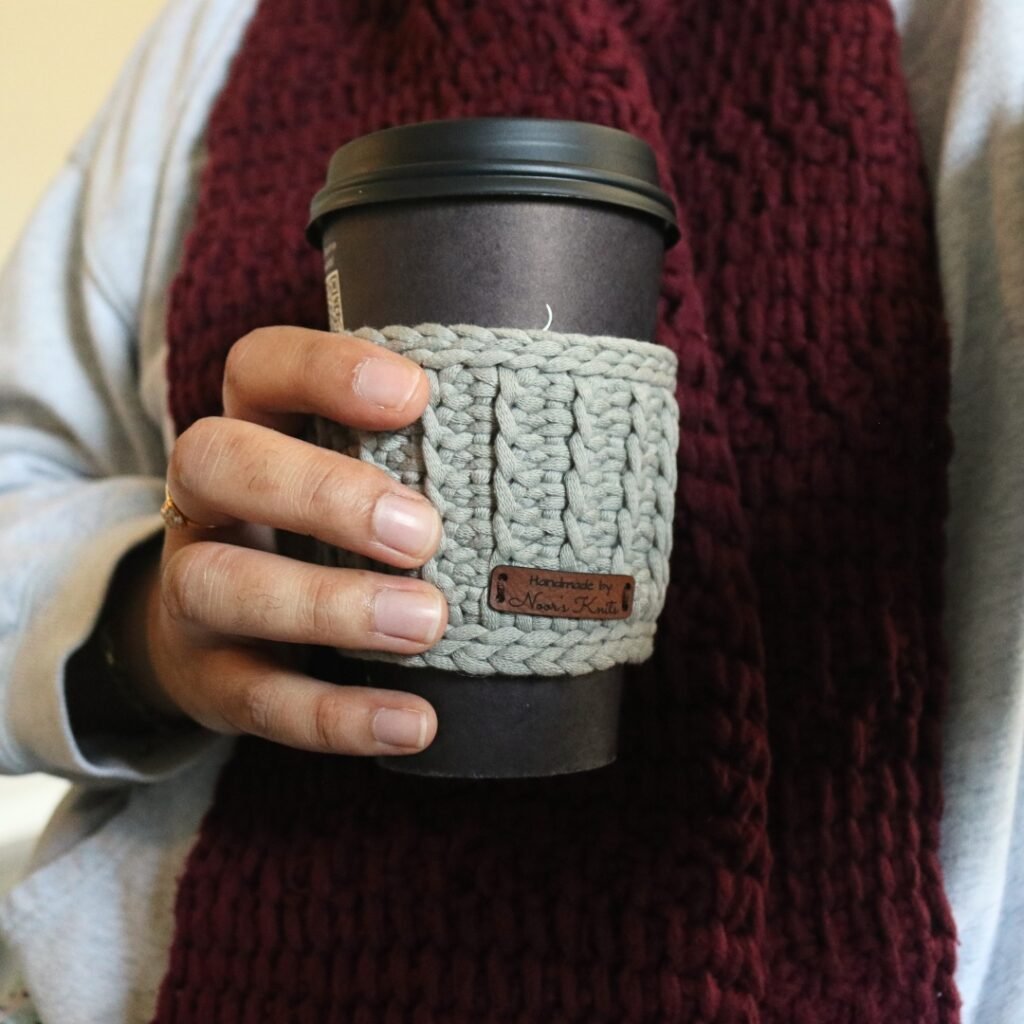 Looking for easy free crochet cup cozy patterns? Check out this fun Tunisian crochet cup holder and crochet mug holder pattern!
