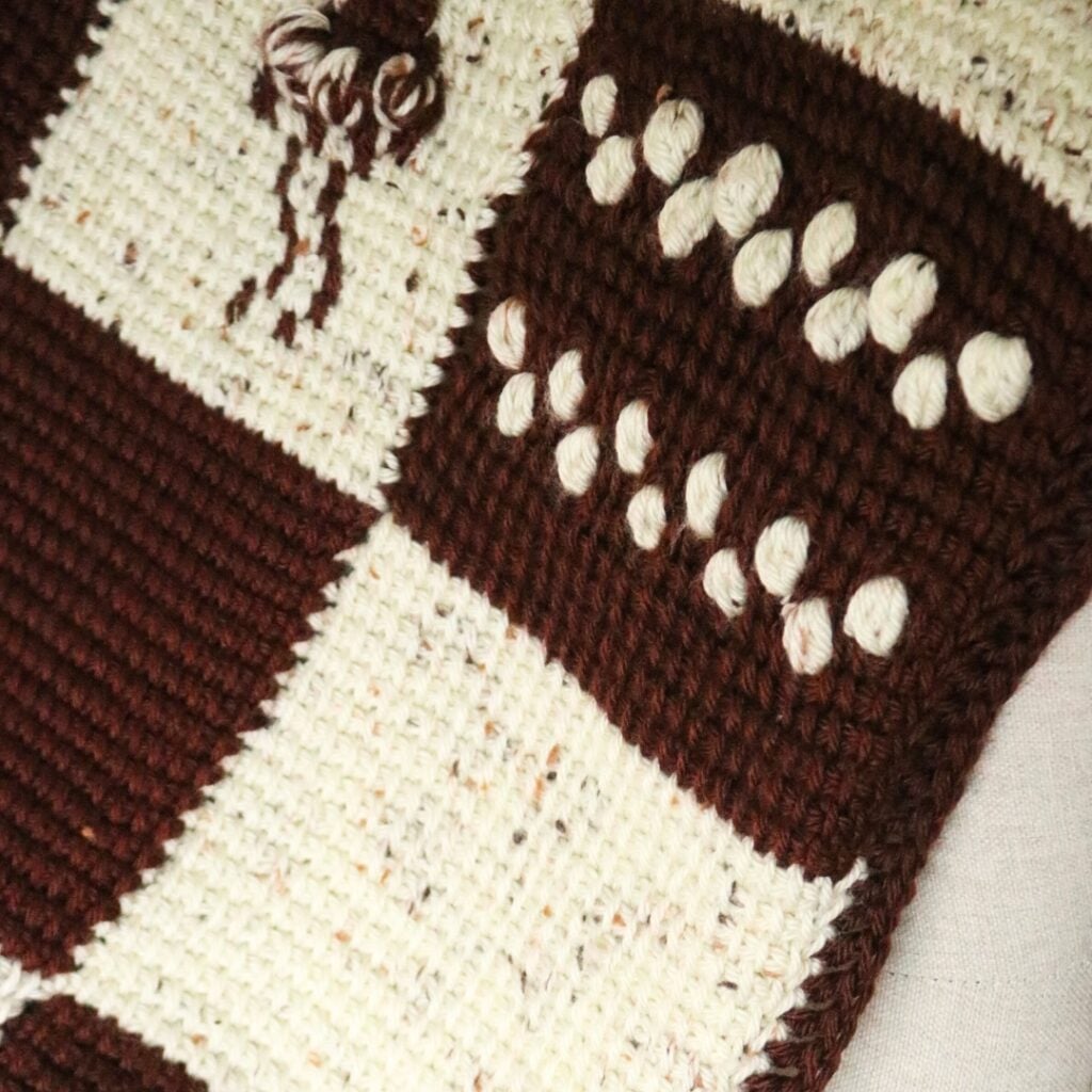 Free crochet afghan patterns featuring the cozy cocoa lapghan with Tunisian crochet stitches and crochet colorwork.