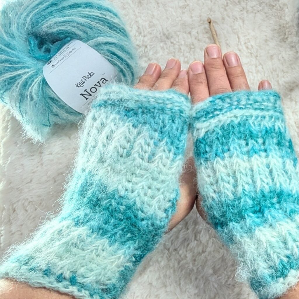 Check out this free fingerless gloves crochet pattern featuring a fun knit-like crochet one row Tunisian crochet stitch pattern.