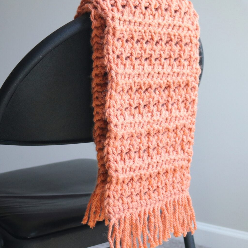 Free crochet scarf pattern using basic Tunisian crochet stitches that creates a beautiful texture for a chunky crochet scarf pattern.